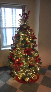 red and gold office christmas tree